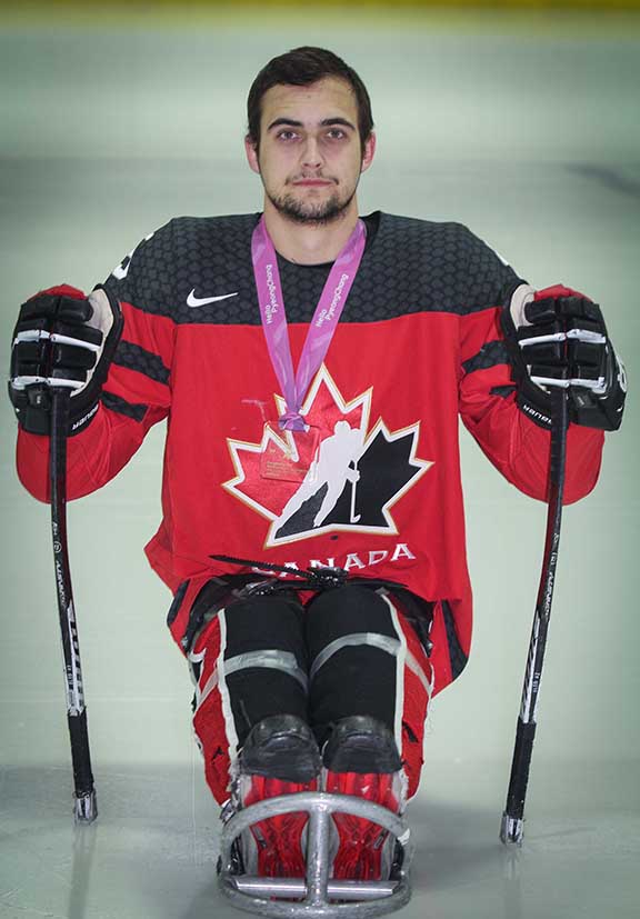 Tyrone Henry of Stittsville on the ice at GRC. Tyrone is a member of the Canadian National Sledge Hockey Team that won Gold in South Korea. Photo by Barry Gray.