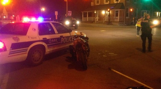 A motorcycle was involved in a collision at Abbott and Stittsville Main on Friday night. Photo by Devyn Barrie.