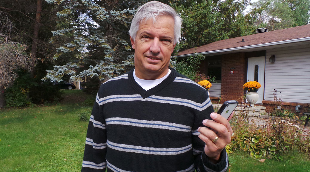 Peter Hanschke in front of his home west of Stittsville Main Street. Photo by Glen Gower.