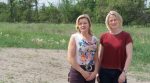 Jennifer Smith (left) and Jenny Guth have been two of the most active parents involved in the push for a public high school. They're standing on one of the possible sites for the new school, at the south west corner of Robert Grant and Cope.