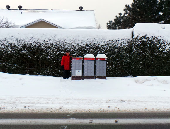 Roger Chagnon stands in a snow bank on West Ridge on February 14 after a snow storm.